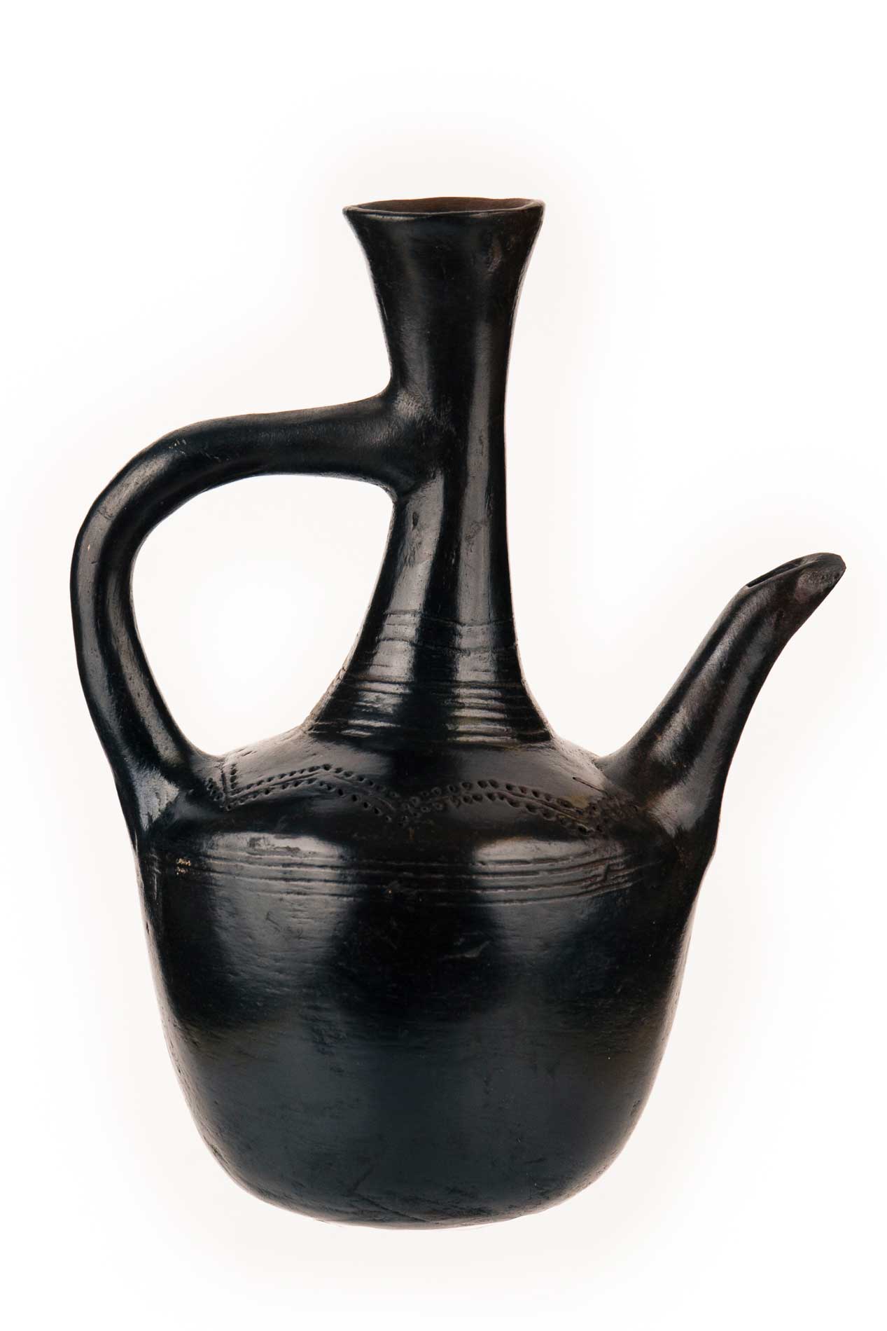 Foto einer künstlerischen Kaffeekanne